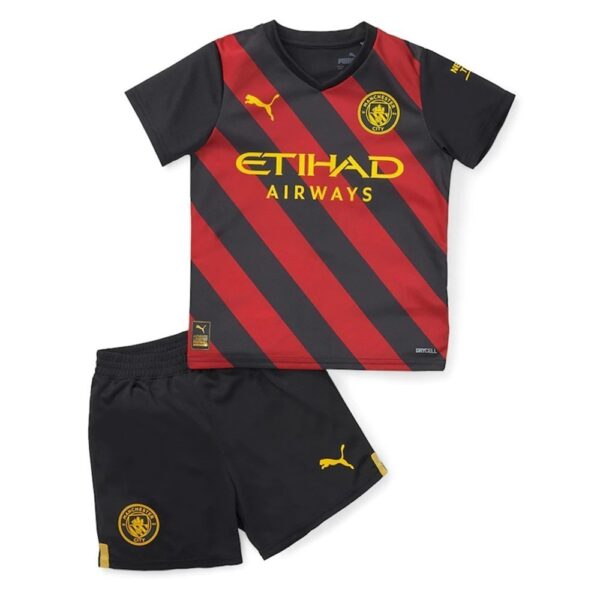 PACK JUNIOR MANCHESTER CITY EXTERIEUR. ENSEMBLE MAILLOT ET SHORT 2022-2023